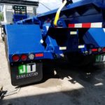 photo of the rear end of a made in Canada new JT Fabrication roll off truck body